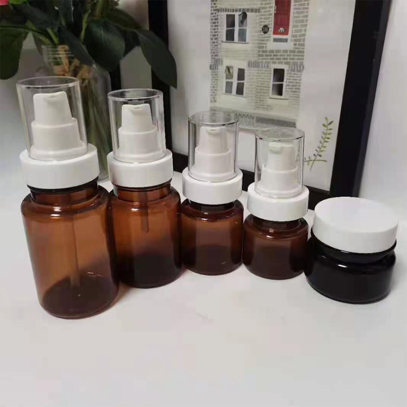 1 2oz Amber round empty glass bottle with lotion pump