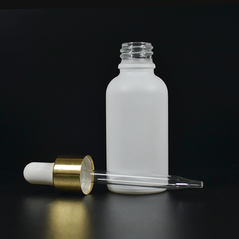1 oz Matt White Glass Boston Round Bottle with Gold Metal and Glass Dropper