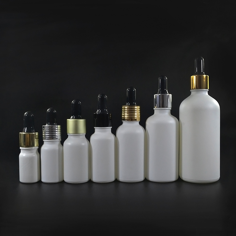 1 oz Matt White Glass Boston Round Bottle with Gold Metal and Glass Dropper