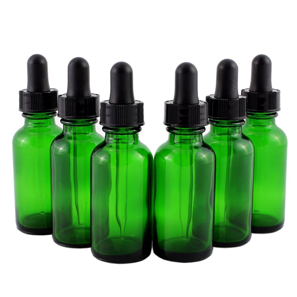 1 oz green boston round bottle with childproof glass dropper