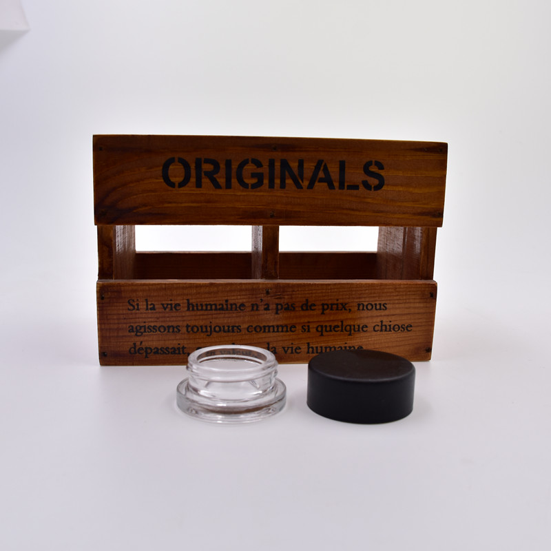 10 ml clear round straight side eye cream cosmetic packing glass jar with plastic child proof lid.