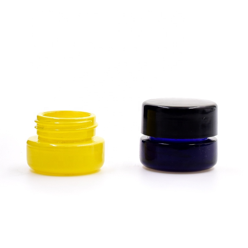 10 ml dark blue round straight side eye cream cosmetic packing glass jar with plastic child proof lid.