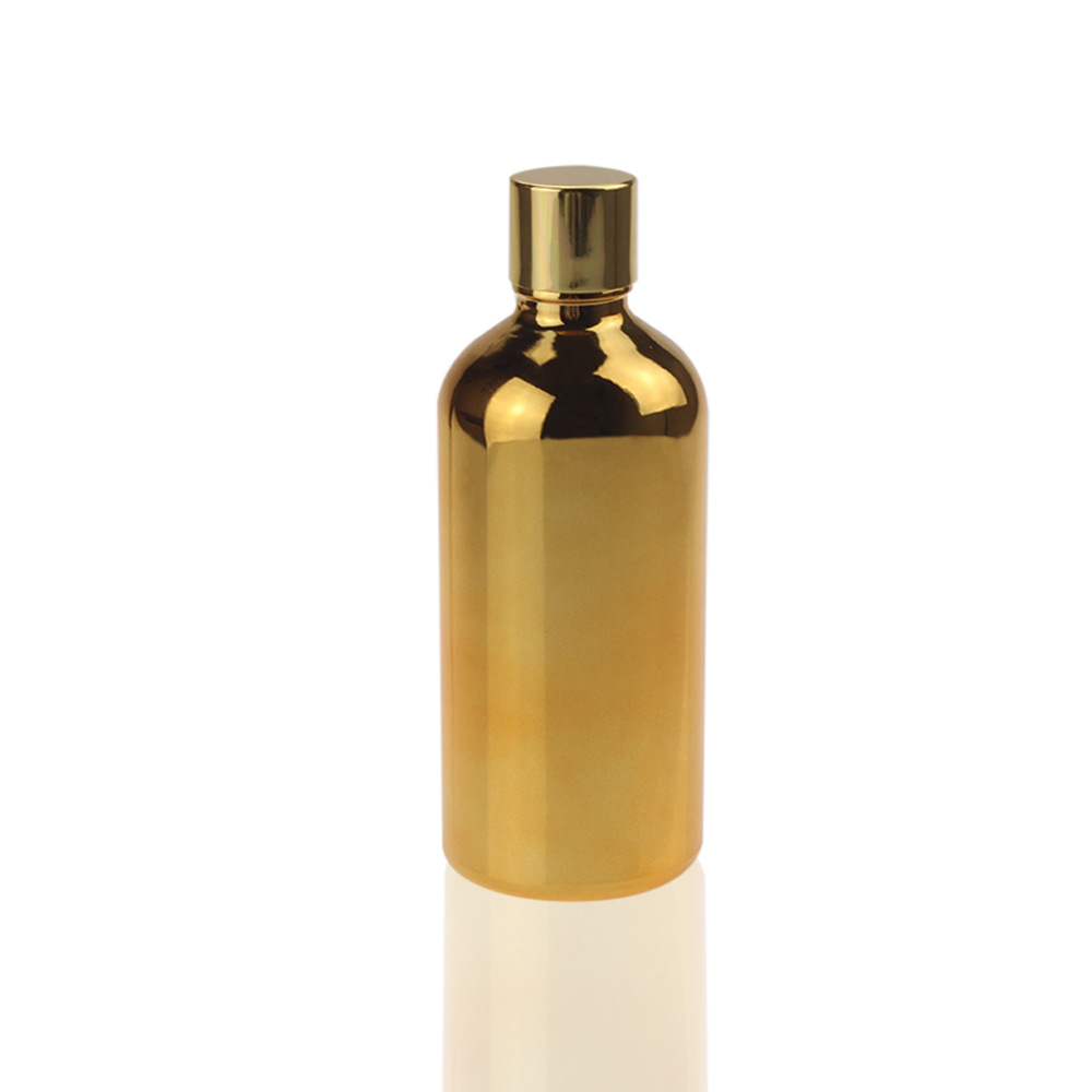 100 ml glass clear black or gold bottle with shiny gold black and silver caps
