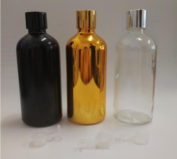 100 ml glass clear black or gold bottle with shiny gold black and silver caps