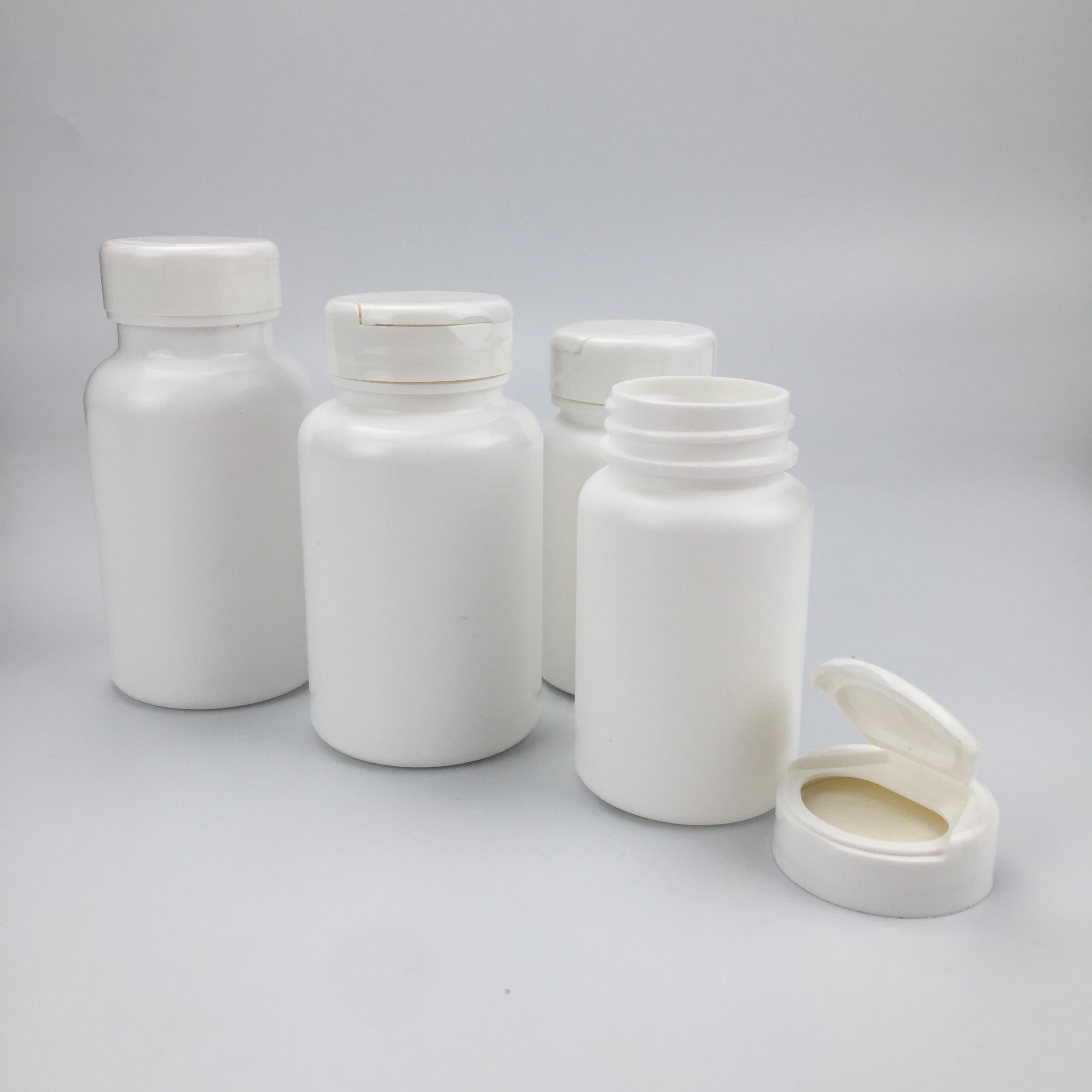 100cc 150cc HDPE Empty Pharmaceutical Plastic Bottles White Vitamin Bottles with Flip Top Cap