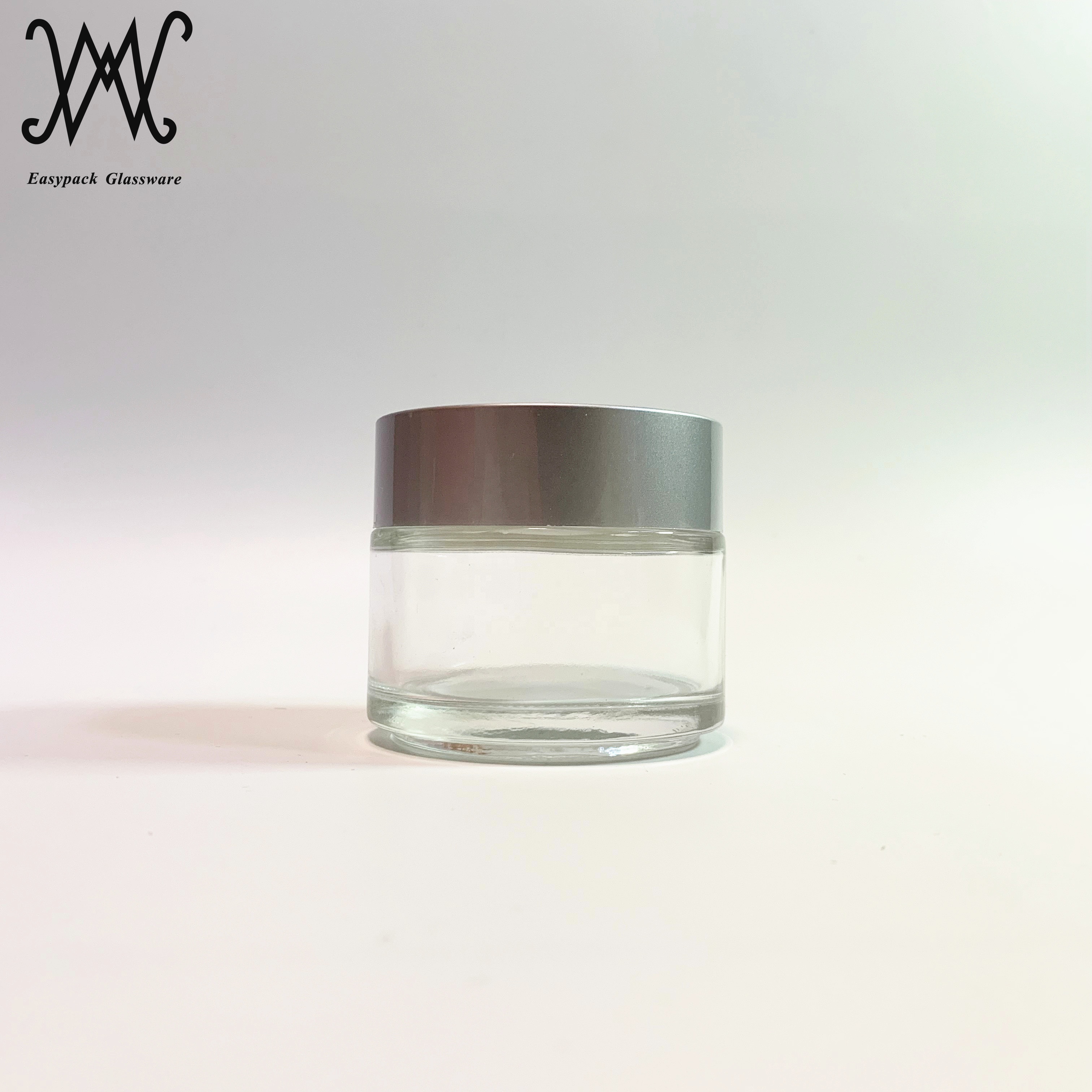 100g 100ml clear glass cosmetic packaging jar with gold metal lid for cream oil