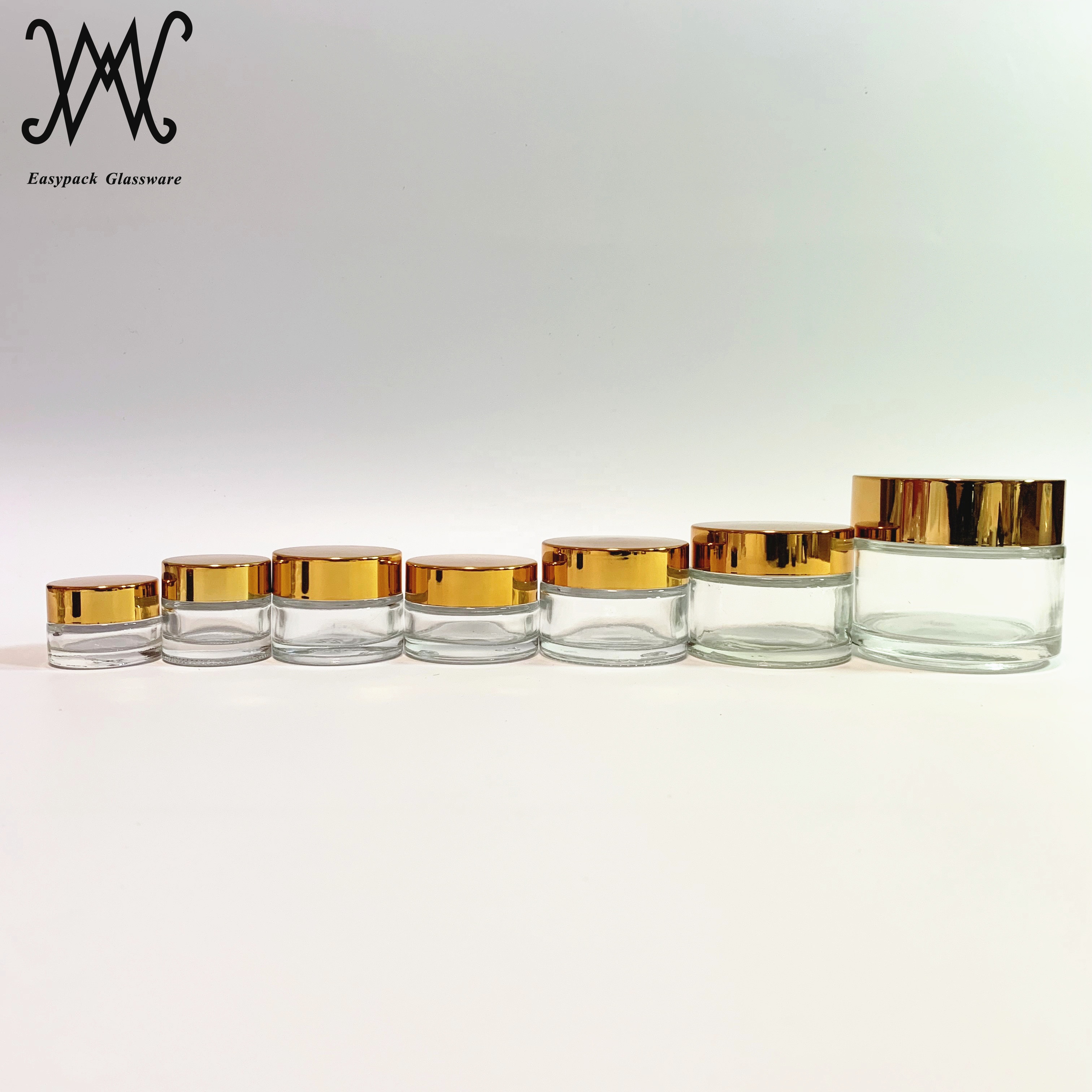 100g 100ml clear glass cosmetic packaging jar with gold metal lid for cream oil