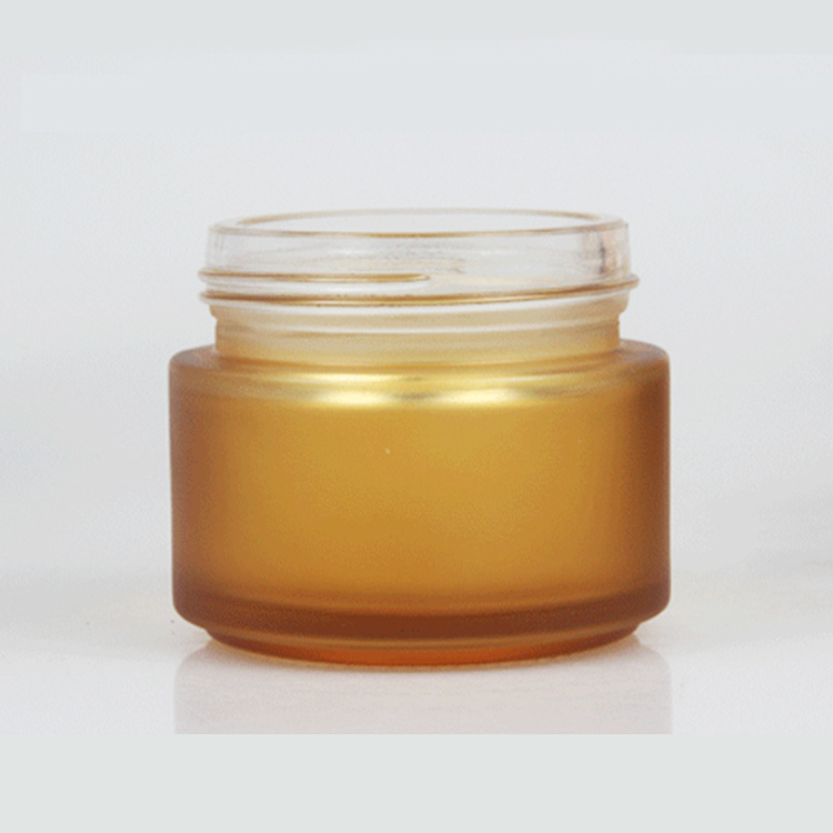 100g amber glass cosmetic cream jar with black gold silver lid