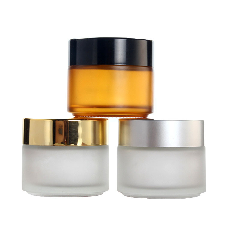 100g brown frosted glass cream jar cosmetic film container with gold black silver plastic lid