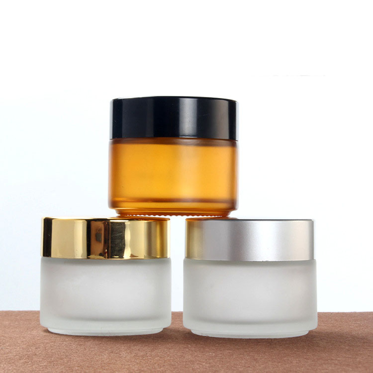 100g brown frosted glass cream jar cosmetic film container with gold black silver plastic lid