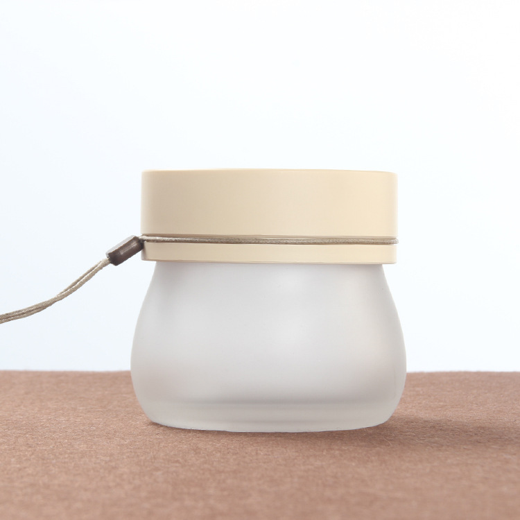 100g frosted glass cream jar cosmetic mask container with plastic gold lid lanyard