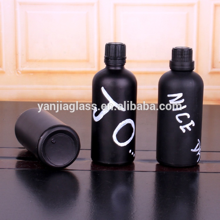 100ml Matte black boston round glass bottle with silk printing logo