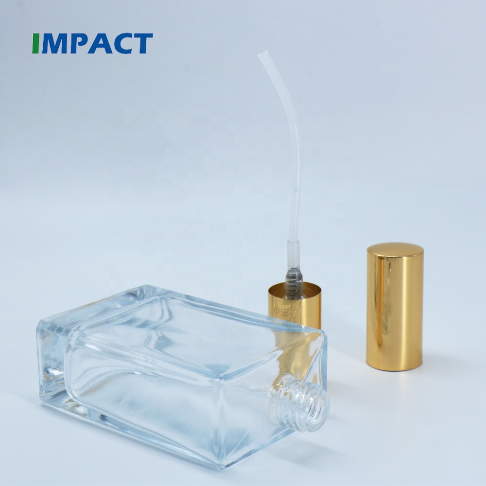 100ml Square Glass Bottle with Gold Mist Pump
