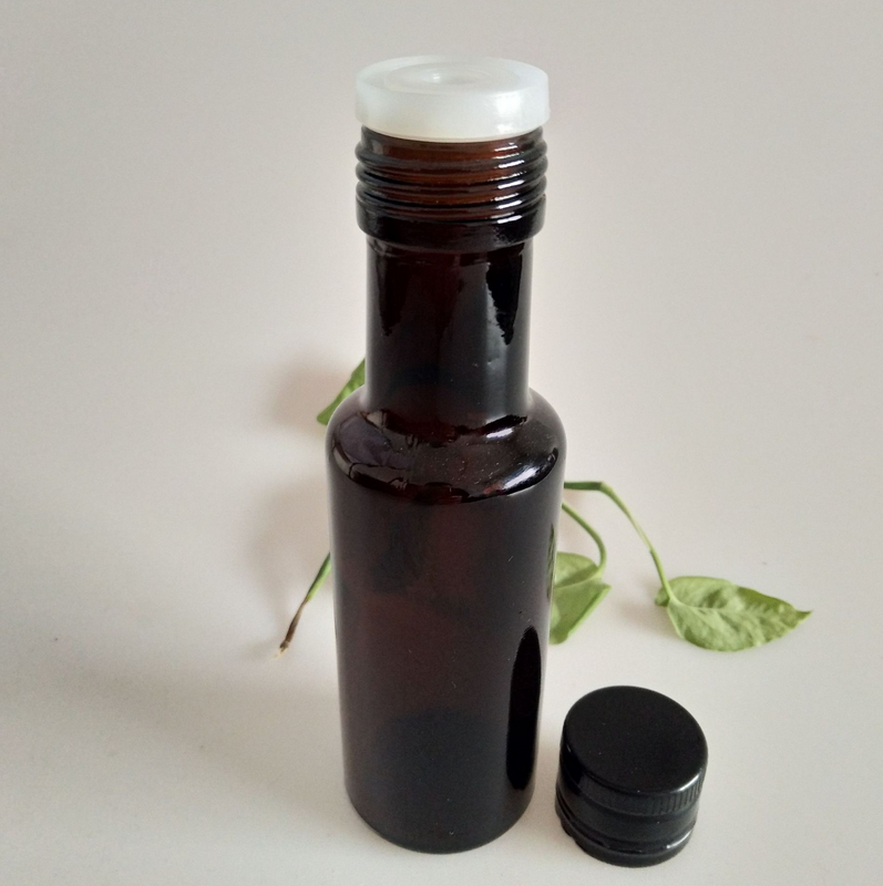 100ml amber color Dorica round glass oil bottle with metal cap