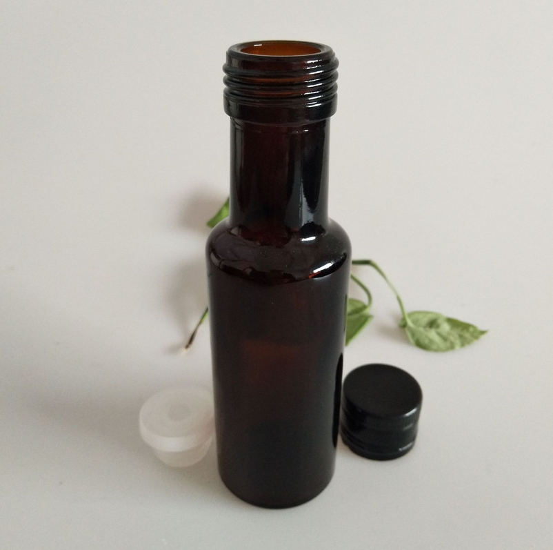 100ml amber color Dorica round glass oil bottle with metal cap