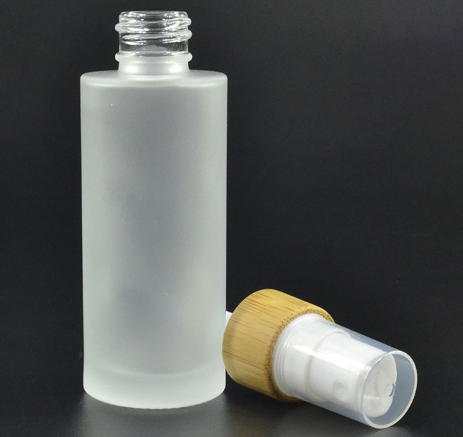 100ml bamboo collar frosted glass lotion pump bottle with bamboo lid