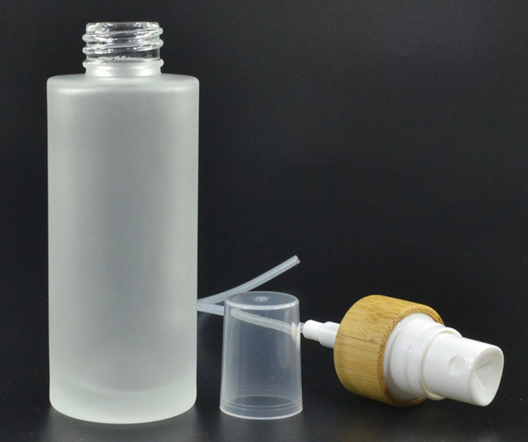 100ml bamboo collar frosted glass lotion pump bottle with bamboo lid