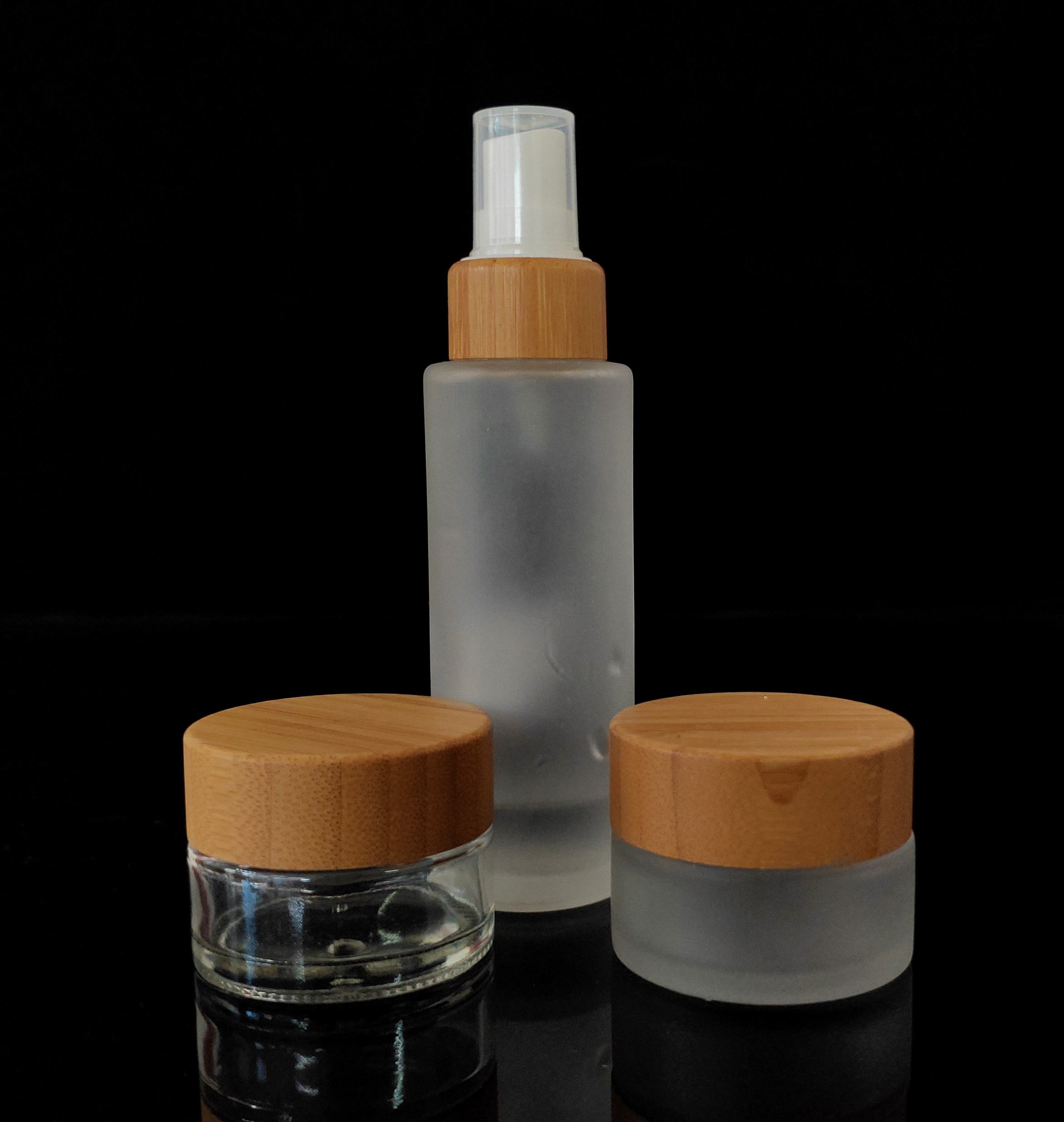 100ml clear frosted cosmetic bottle with pump bamboo cap