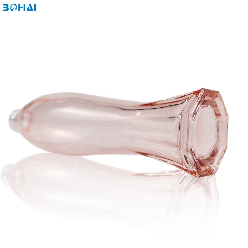 100ml clear pink glass serum bottle with lotion pump flower cap