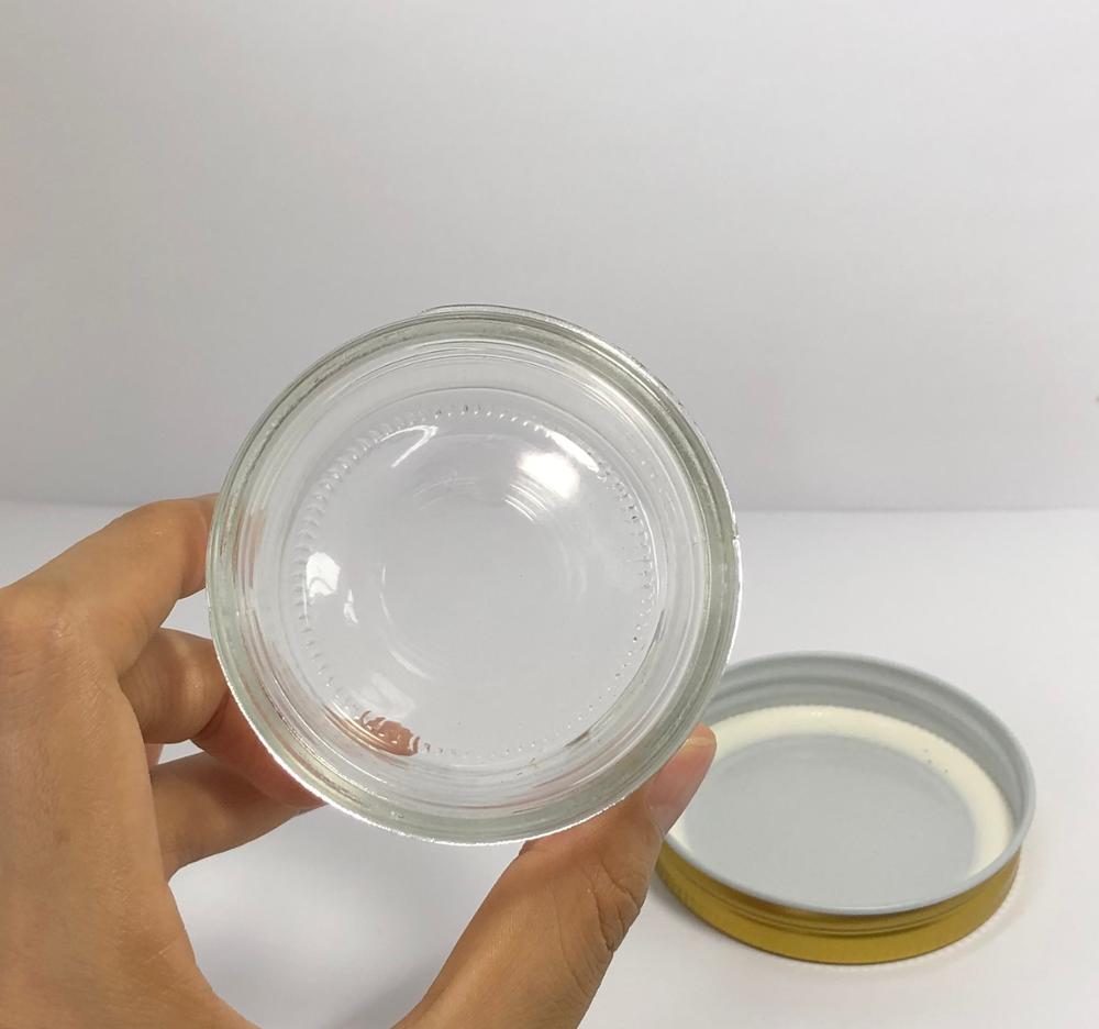 100ml clear round glass jar with silver metal screw cap and colorful labels