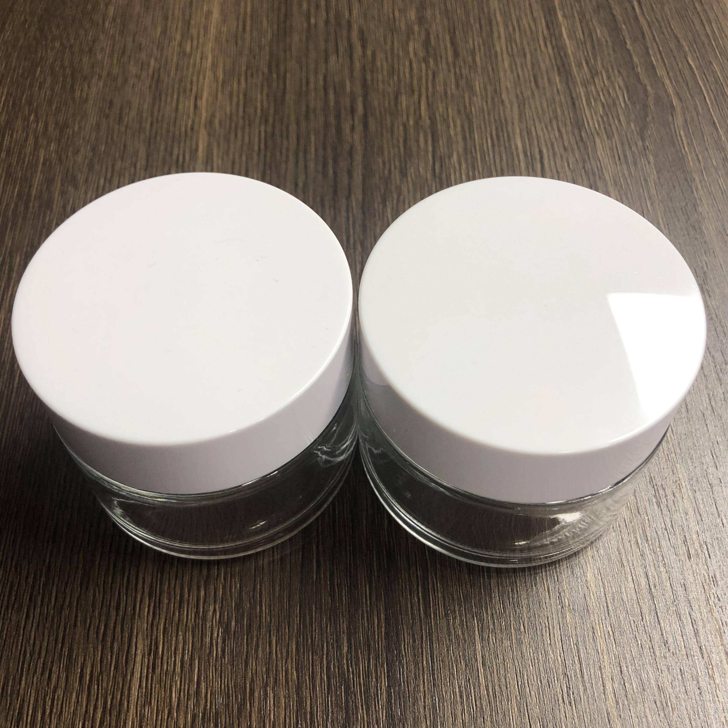 100ml cream cosmetic glass jar with glossy white smooth PP cap and inner tape