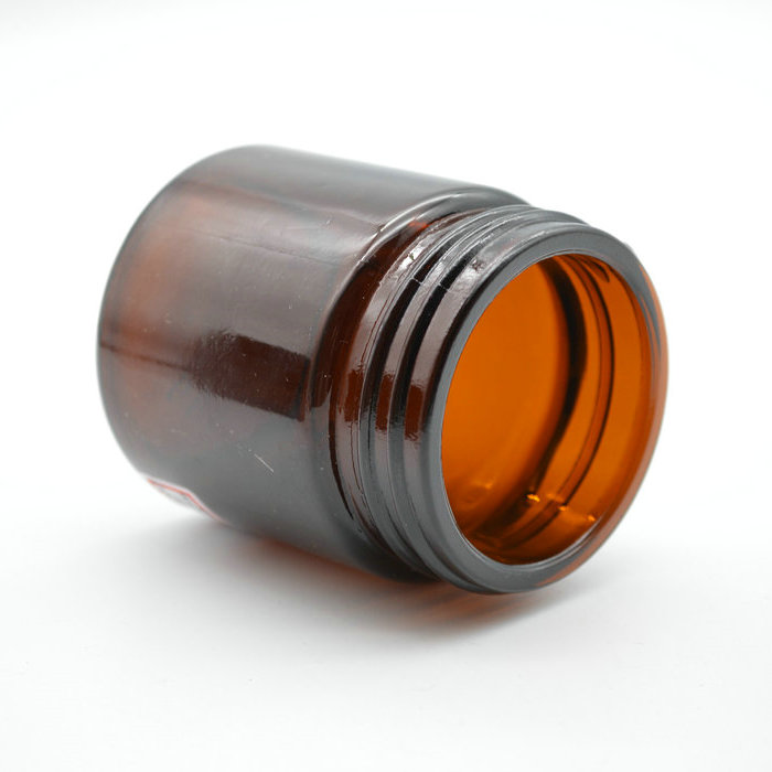 100ml empty round amber cosmetic face lotion cream glass jar with black screw cap