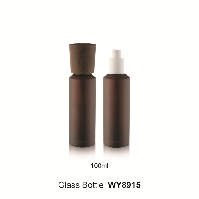 100ml fancy luxury unique cosmetic glass pump lotion bottle with black wooden color lid and stopper