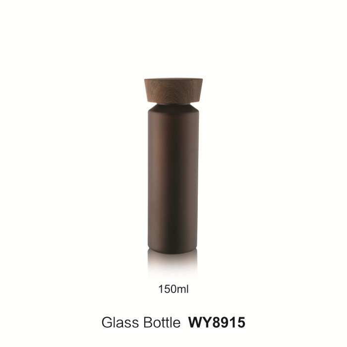 100ml fancy luxury unique cosmetic glass pump lotion bottle with black wooden color lid and stopper