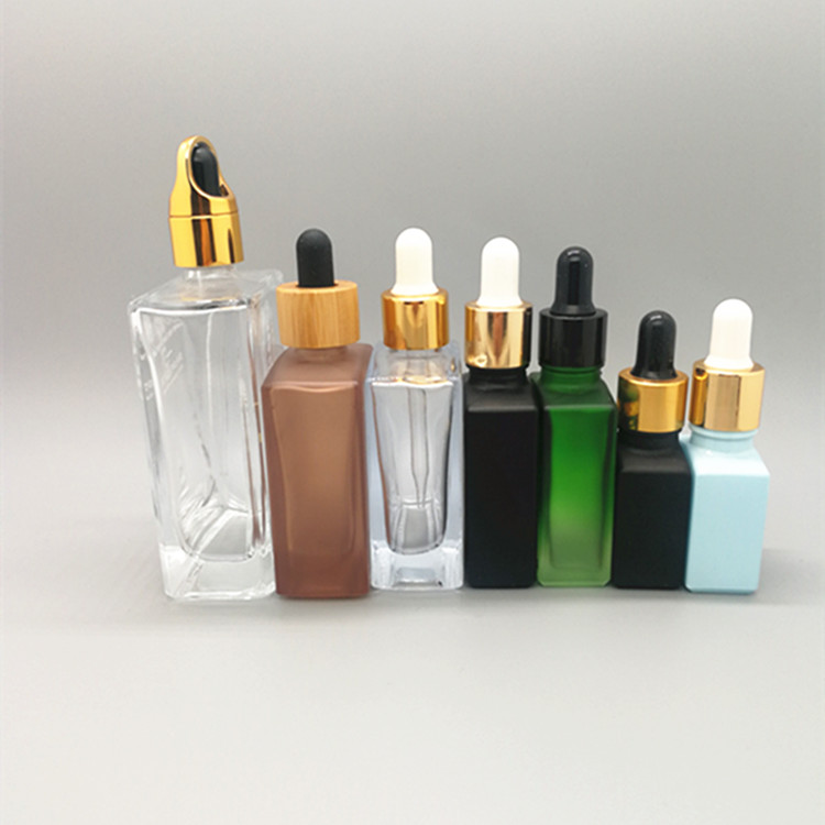 100ml glass bottle beard oil glass bottle essential oil glass bottle with various painted and various cap topper