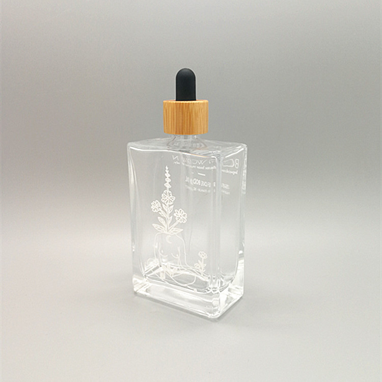 100ml glass bottle beard oil glass bottle essential oil glass bottle with various painted and various cap topper