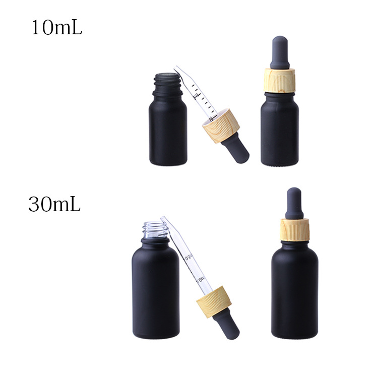 10m dumb black essential oil bottle grey rubber tip curved dropper with graduated 30mL wood grain dropper bottle