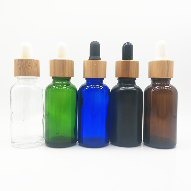 10ml 15ml 30ml 50ml 100ml amber blue green frosted dropper bottle 30 ml clear glass bottle with bamboo dropper caps