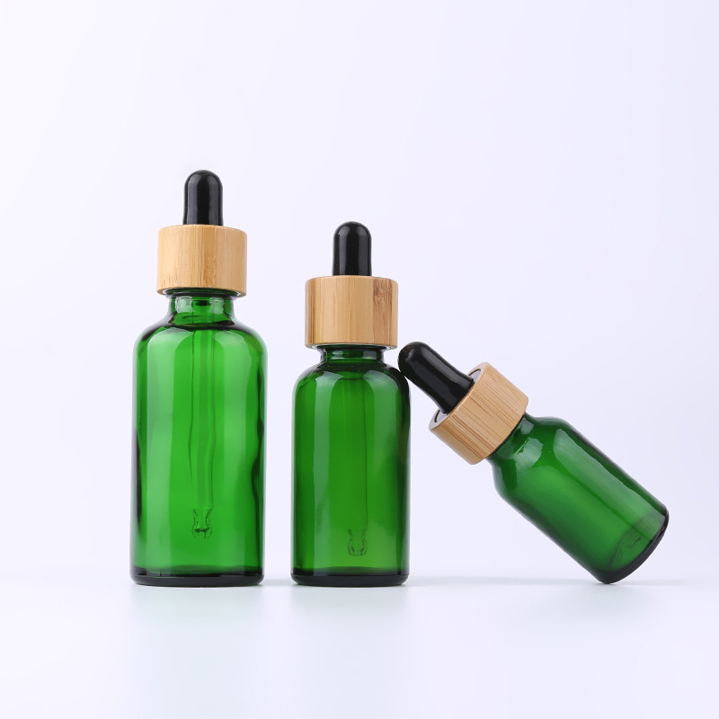 10ml 15ml 30ml 50ml 100ml amber blue green frosted dropper bottle 30 ml clear glass bottle with bamboo dropper caps