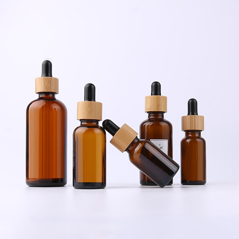 10ml 15ml 30ml 50ml 100ml amber blue green frosted dropper bottle 30 ml clear glass bottle with bamboo dropper caps