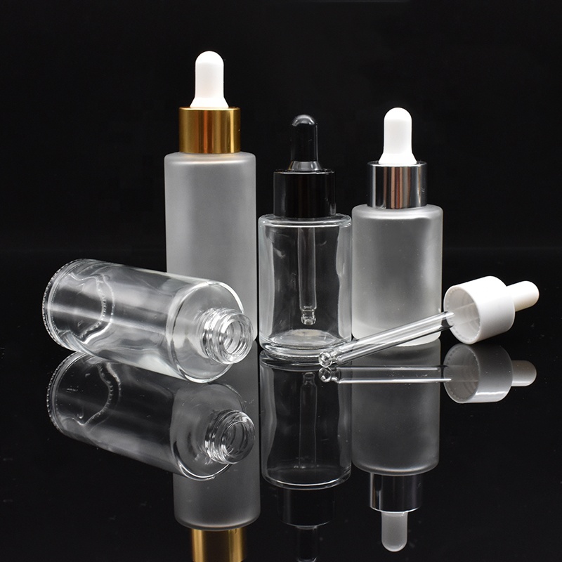 10ml 20ml 30ml 50ml glass dropper bottles clear frosted flat shoulder glass bottles with glass dropper for cosmetic essence