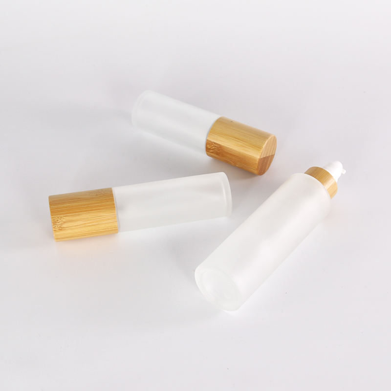10ml 30ml 50ml different customized glass lotion bottle with sprayer pump bamboo collar