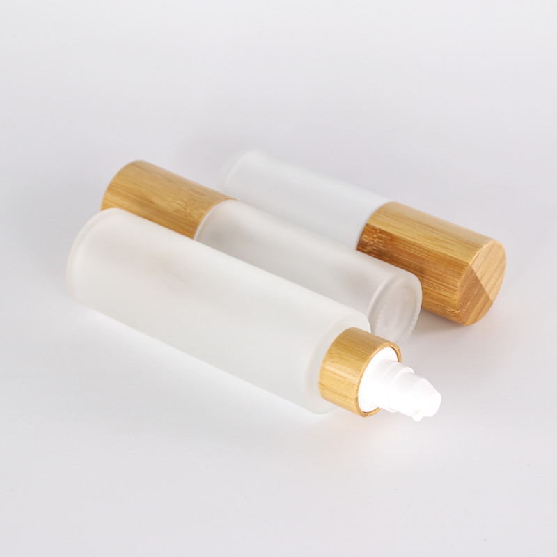 10ml 30ml 50ml different customized glass lotion bottle with sprayer pump bamboo collar