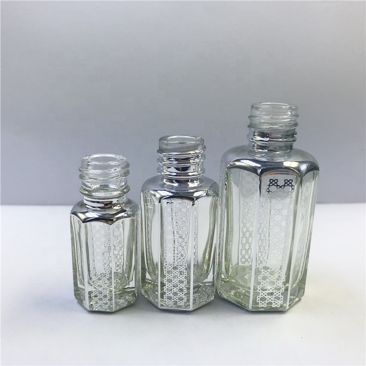 12ml Wholesale Hot Stamping Logo Octagonal Shape Attar Perfume Arabian Oud Oil Glass Bottle With Glass Stick Glass Oil Bottle