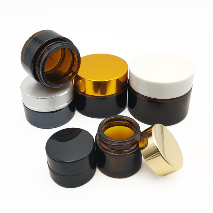15g 1oz 30g 2oz 60g 100g clear frosted amber glass container jar with silver gold and black color cap cosmetic jars glass