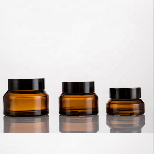 15g 30g 50g empty round oblique amber glass jar glass cosmetic jars with black plastic cap for face body cream
