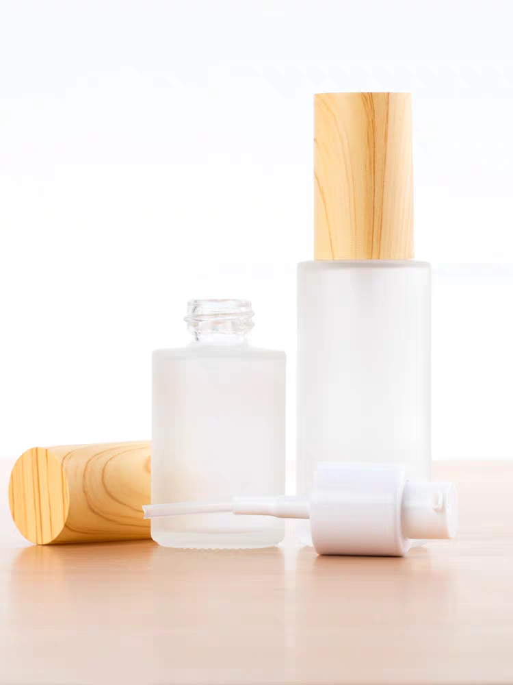 15ml 30ml 100ml clear clear frosted cosmetic packing glass lotion bottle with bamboo cap