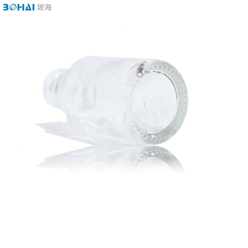 15ml 30ml 50ml 100ml clear amber boston round glass dropper bottle with white rubber gold cap of skincare packaging