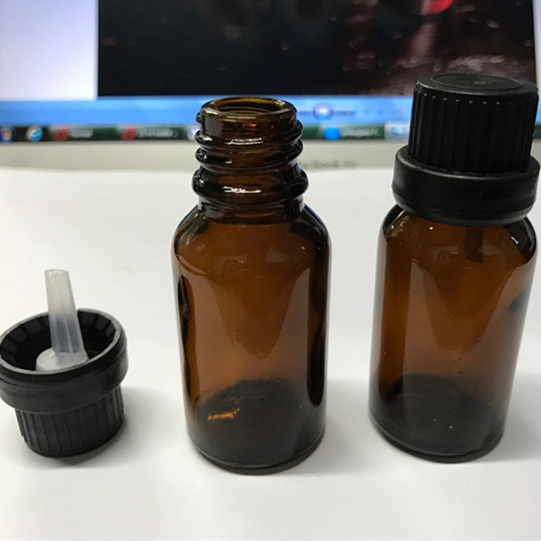 15ml amber essential oil bottle with black temper evident screw cap and dropper insert