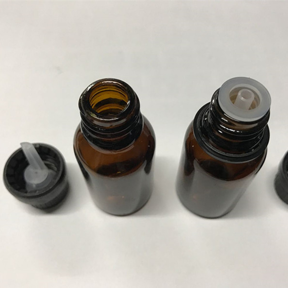 15ml amber essential oil bottle with black temper evident screw cap and dropper insert