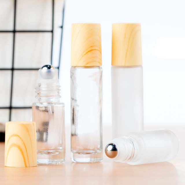 15ml essential oil roller ball perfume transparent glass bottle with bamboo lid and bamboo cap