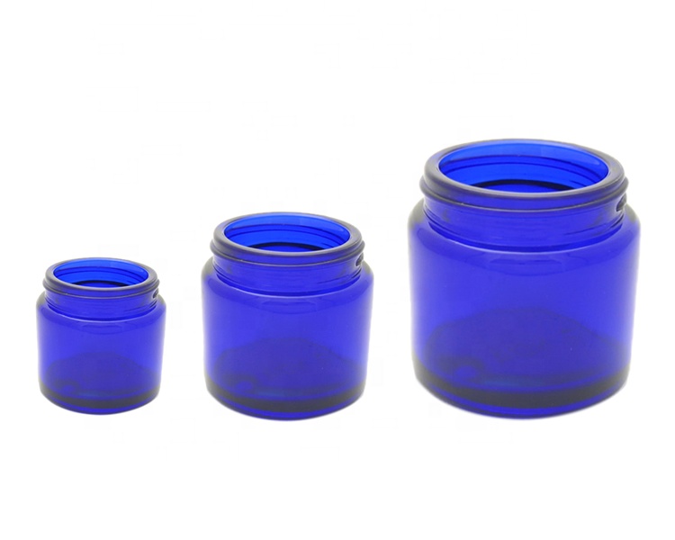 15pcs small packaging Stock wide mouth 2oz 60ml round cream blue cosmetic glass jar with lid
