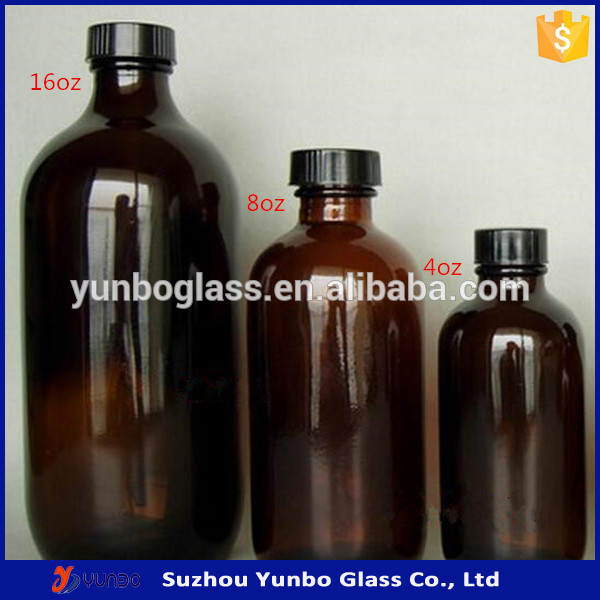 16 oz amber boston round glass bottles with black screw cap for personal care massage oil