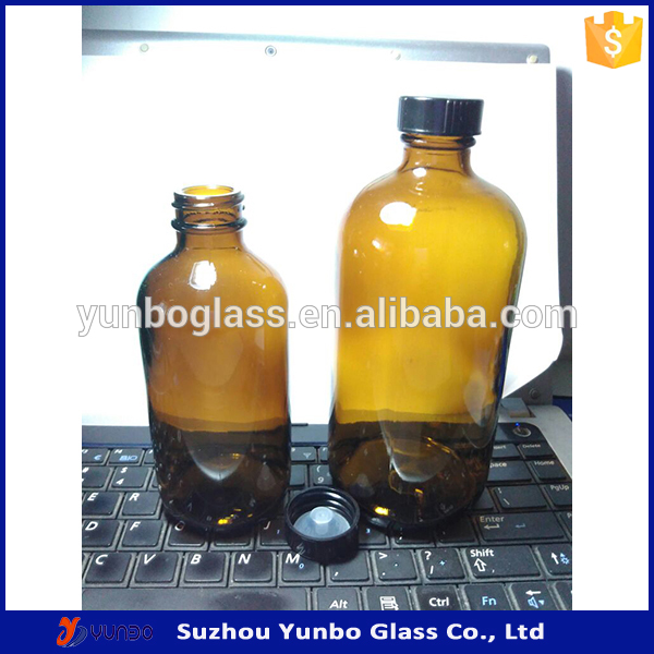 16 oz amber boston round glass bottles with black screw cap for personal care massage oil