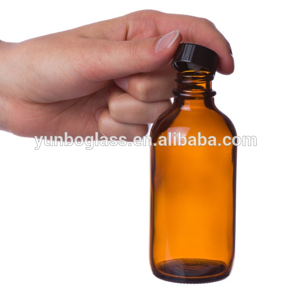 16 oz amber boston round glass bottles with black screw cap for personal care massage oil