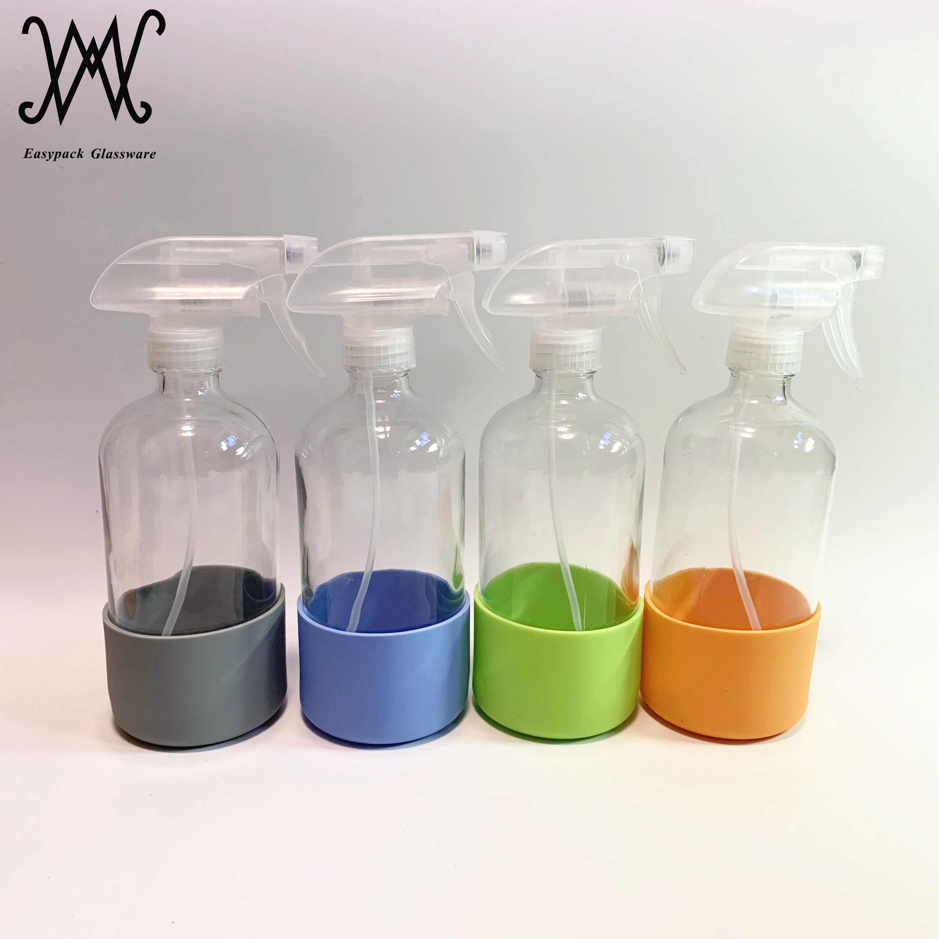16oz 500ml clear amber cobalt blue boston round glass spray bottle with silicone sleeve custom logo